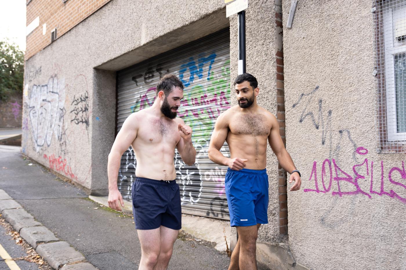 Two members walking back after an outdoor finisher